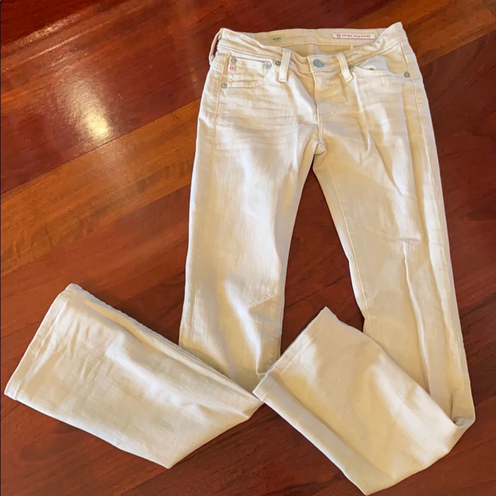 AG Adriano golds chimed tan boot cut jeans 24